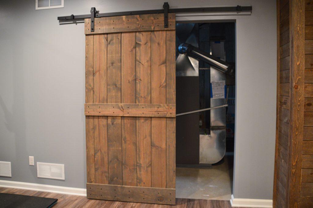 Finished basement sliding wood door in Berkley, Michigan