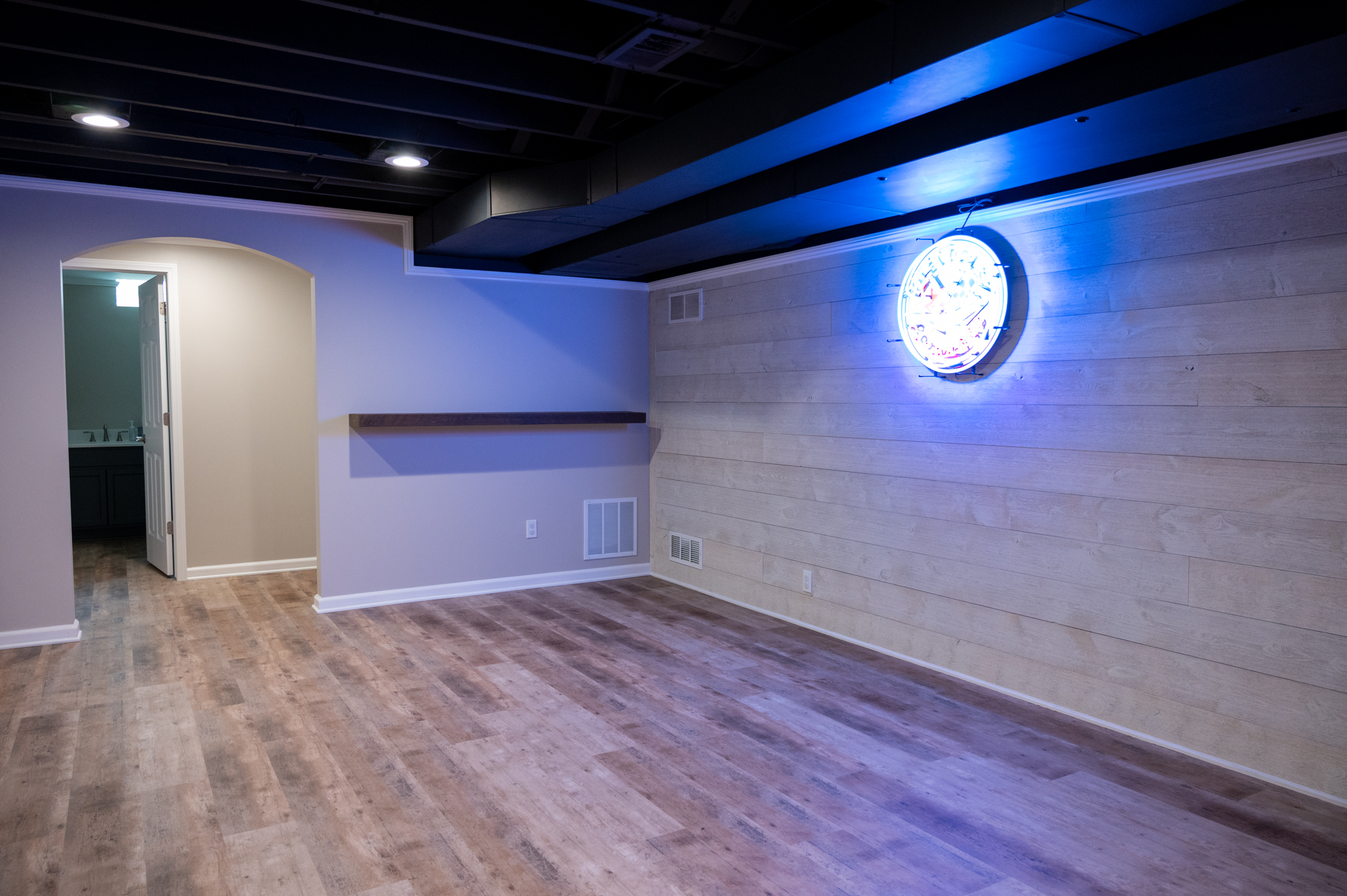 Finished Basement with Wet Bar, Home Gym and Large Entertainment Center