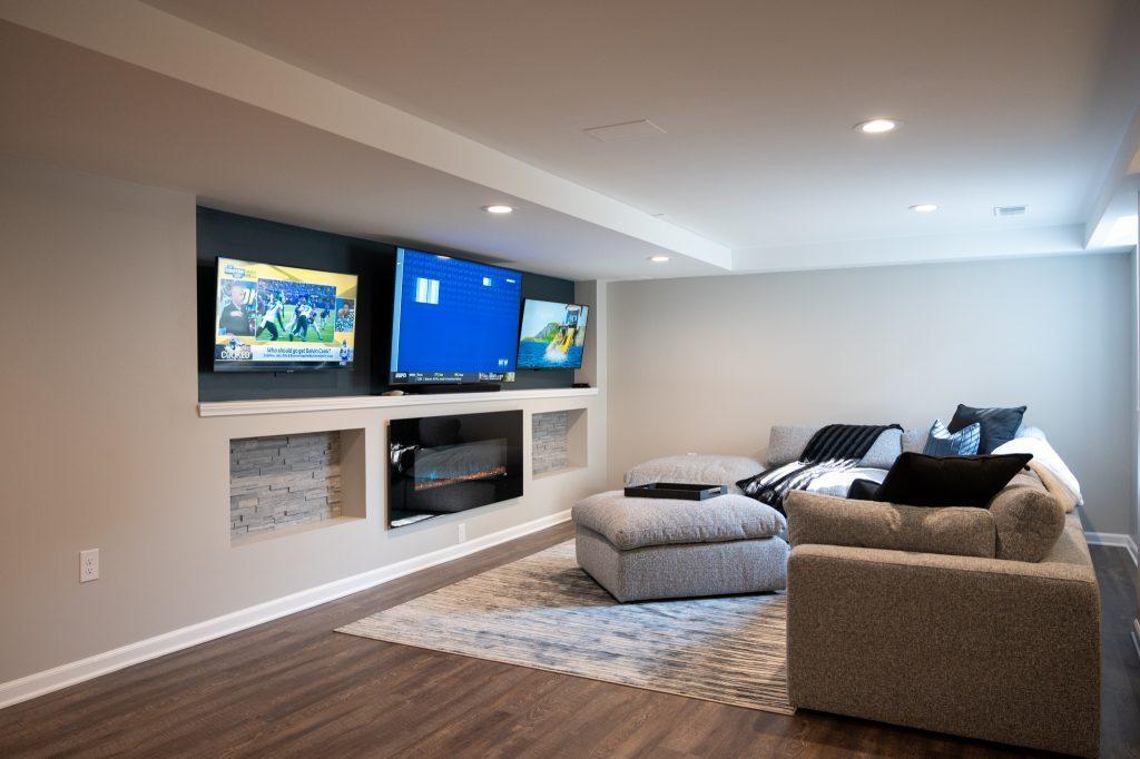 Finished basement living room tv wall in New Hudson, Michigan