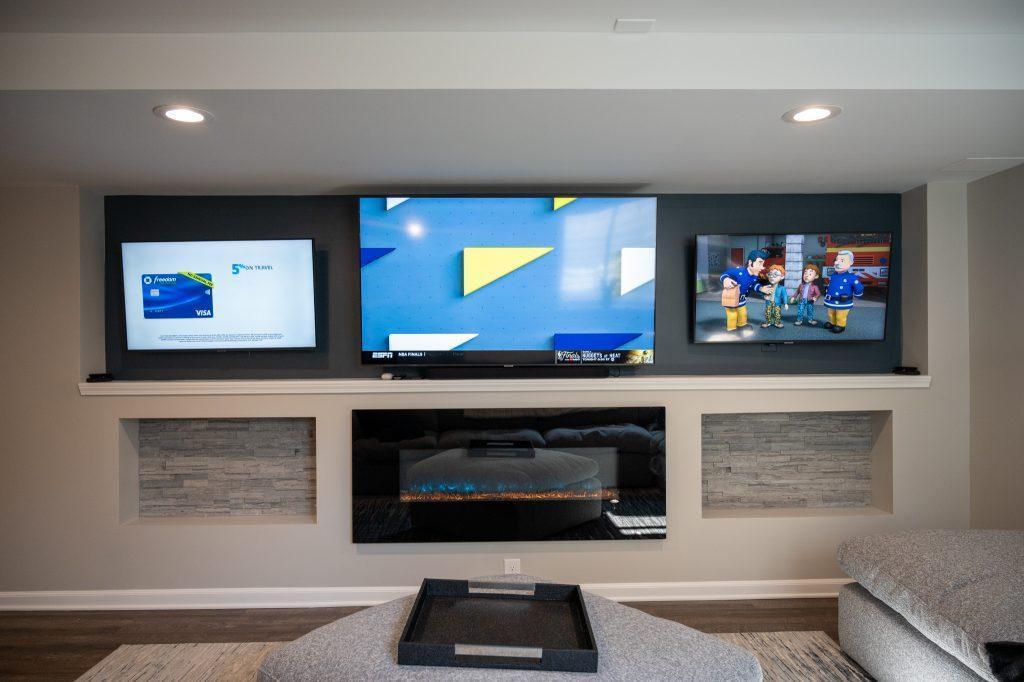 Finished basement living room tv wall in New Hudson, Michigan
