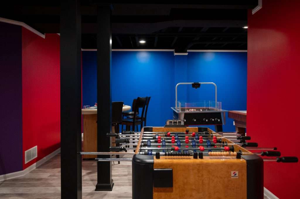 Finished basement game area in Northville, Michigan