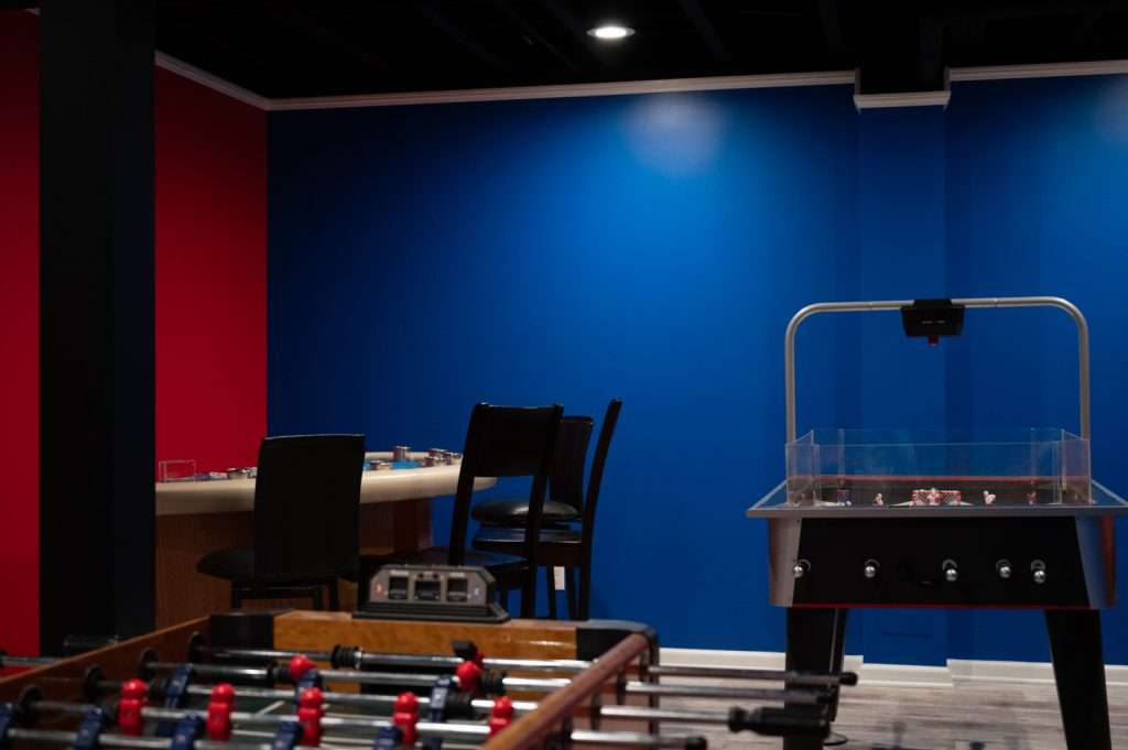 Finished basement game area in Northville, Michigan