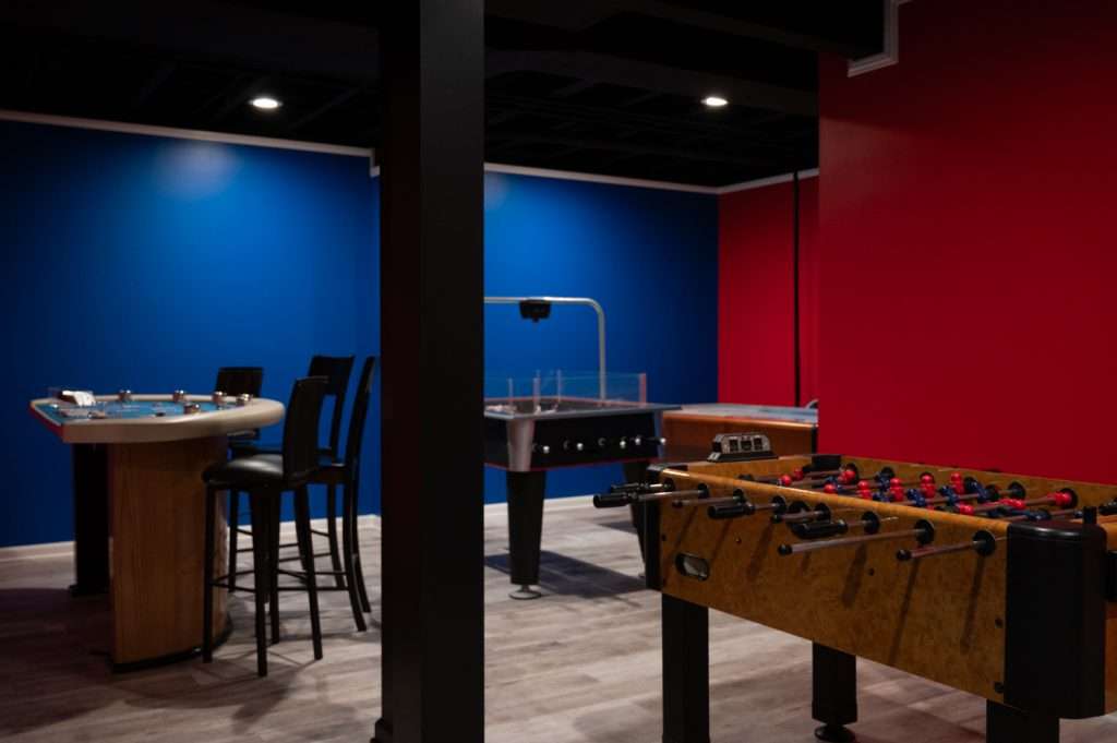 Finished basement game area in Northville, Michigan
