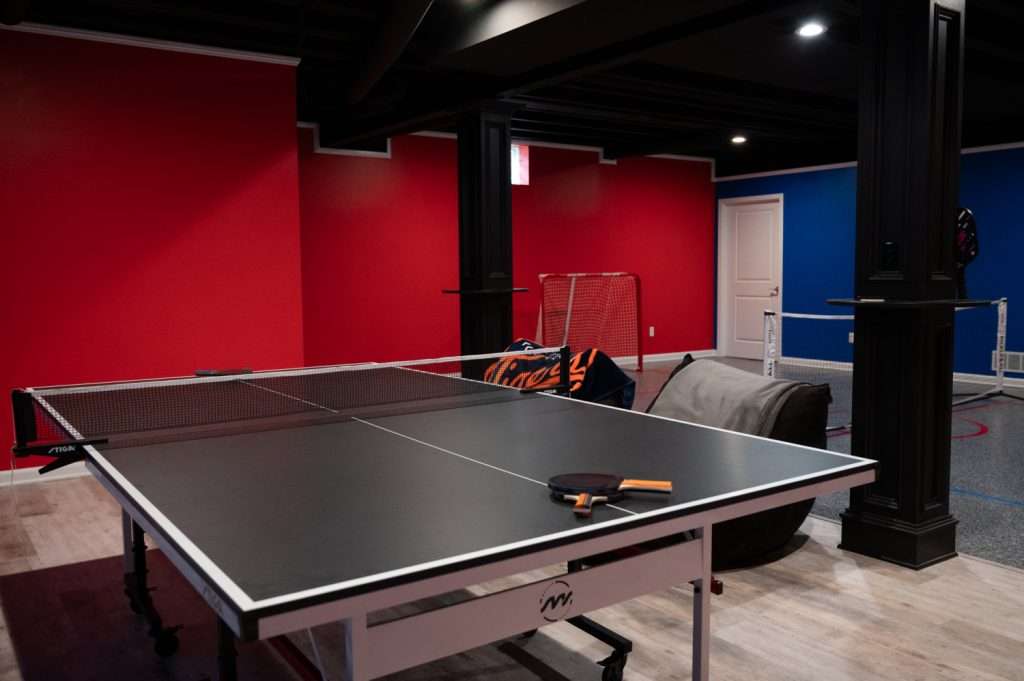 Finished basement game area in Northville, Michigan