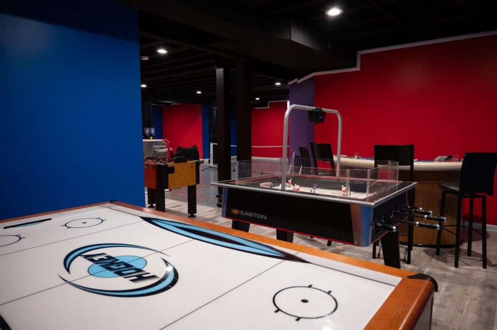 Finished basement game area in Northville, Michigan