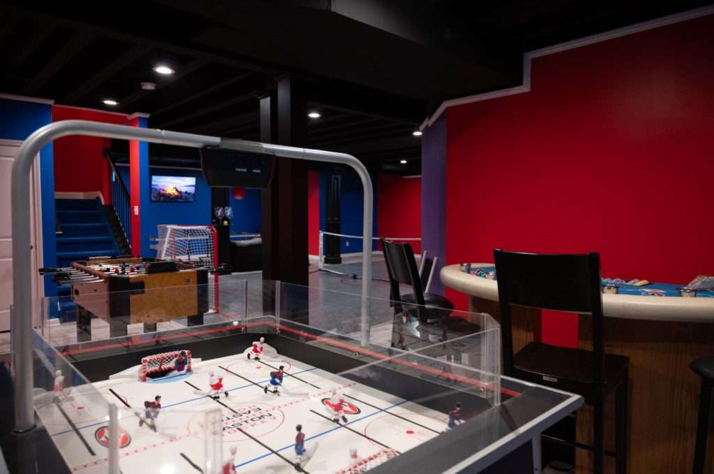 Finished basement game area in Northville, Michigan