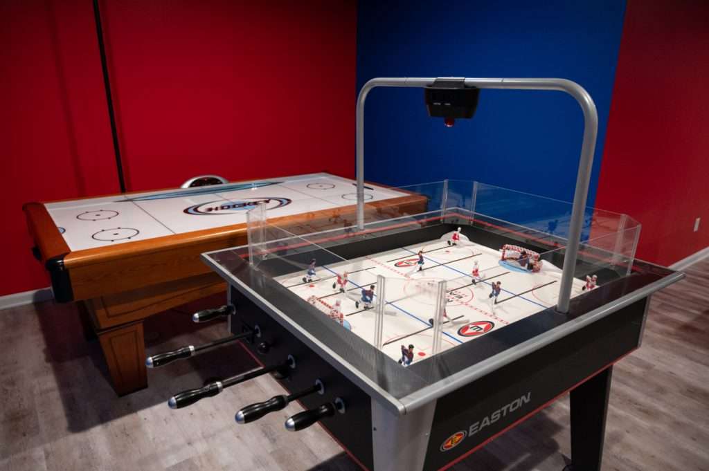 Finished basement game area in Northville, Michigan