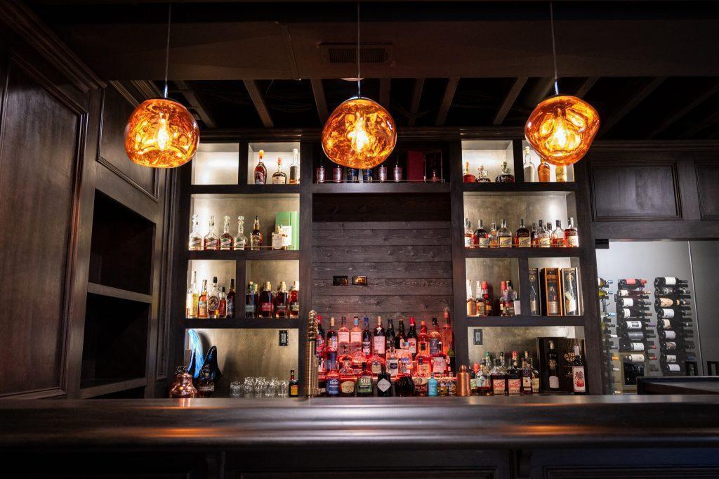 Finished basement oak wood bar in Bloomfield Hills, Michigan