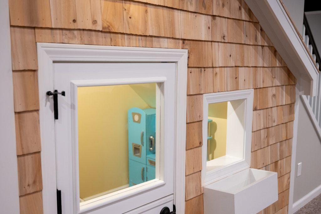 Finished basement under stairs kids playhouse in Bloomfield Hills, Michigan