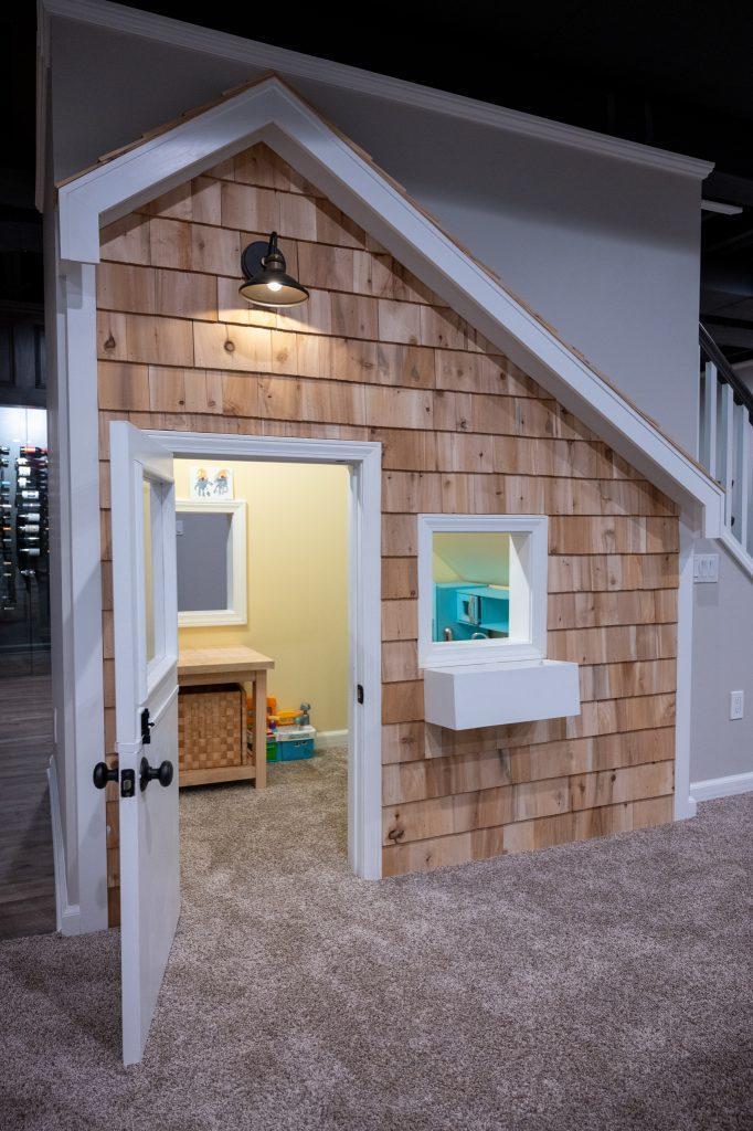 Finished basement under stairs kids playhouse in Bloomfield Hills, Michigan