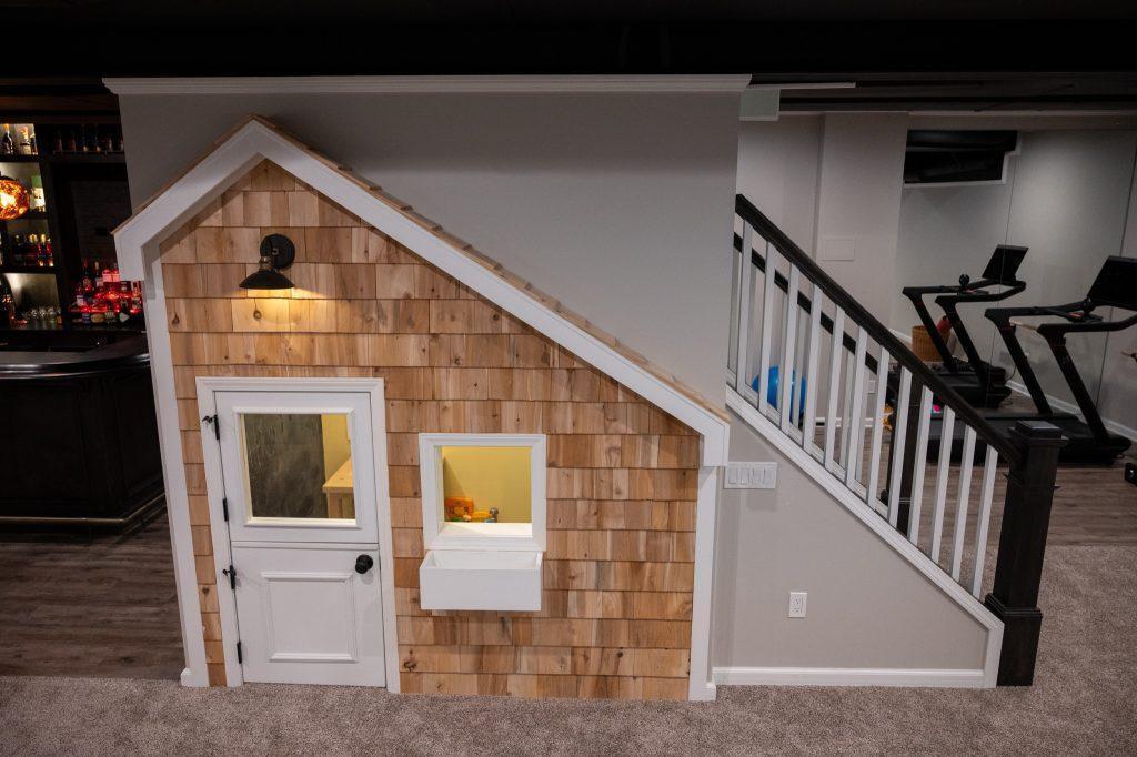 Finished basement under stairs kids playhouse in Bloomfield Hills, Michigan