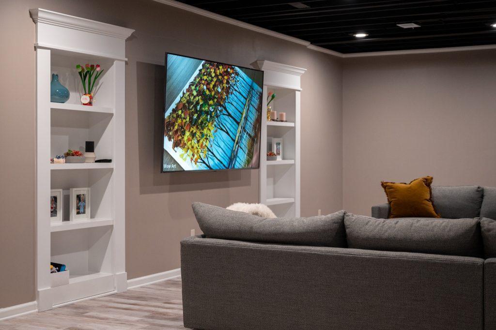 Finished basement living room with secret doors in Troy, Michigan