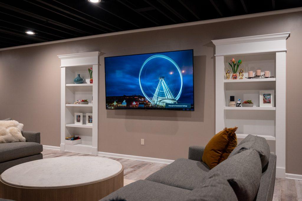 Finished basement living room with secret doors in Troy, Michigan