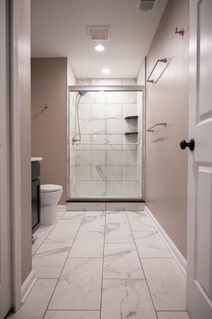 Finished basement bathroom with walk-in shower in Troy, Michigan