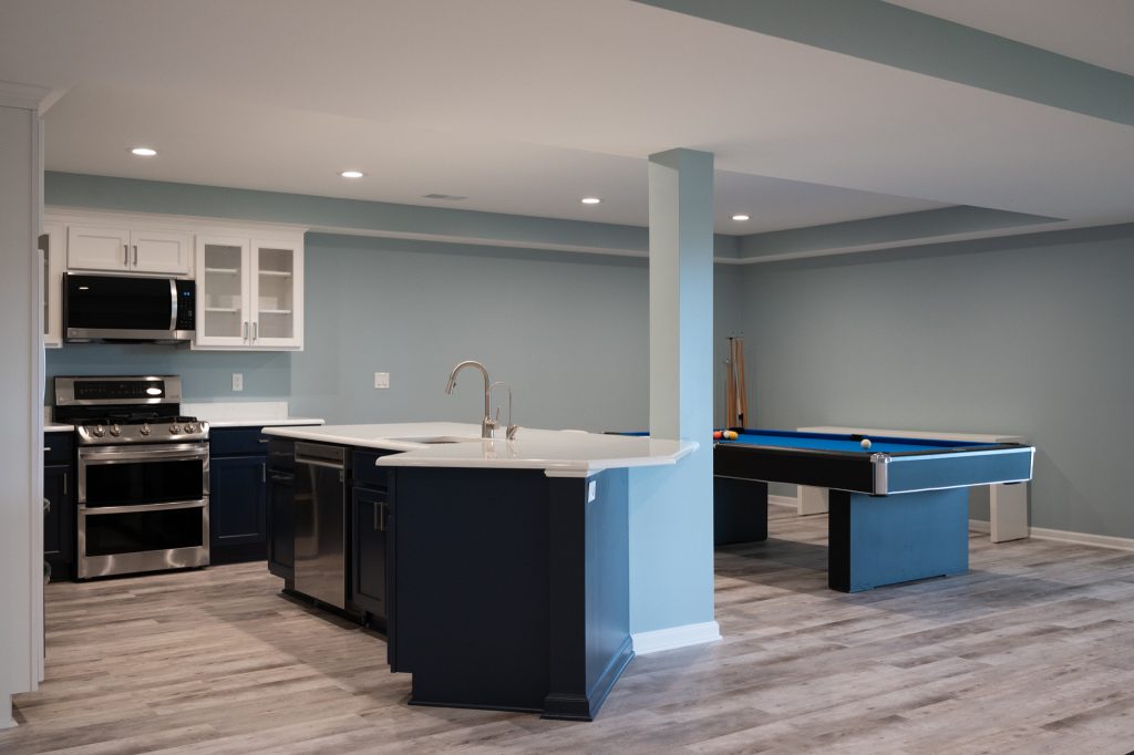 Finished basement kitchen and game area in White Lake, Michigan