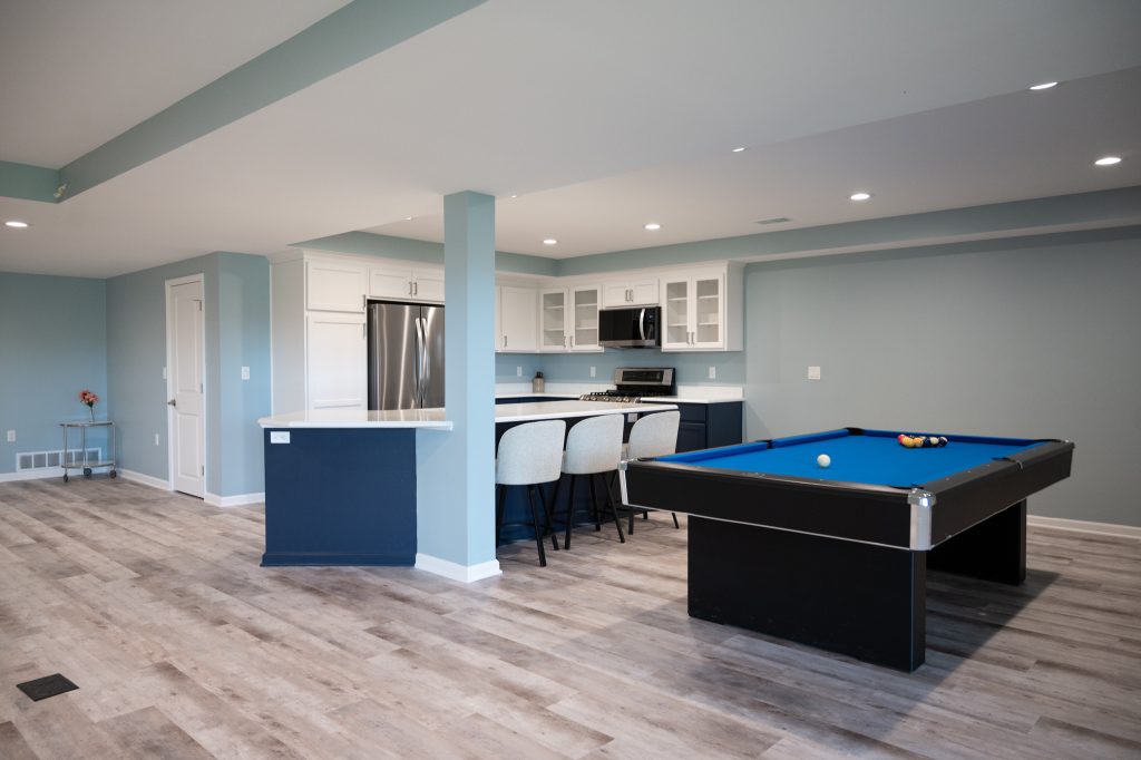 Finished basement kitchen and game area in White Lake, Michigan