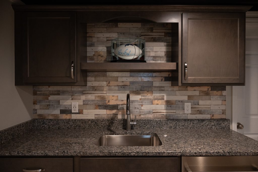 Wet bar in renovated basement by Basements Plus
